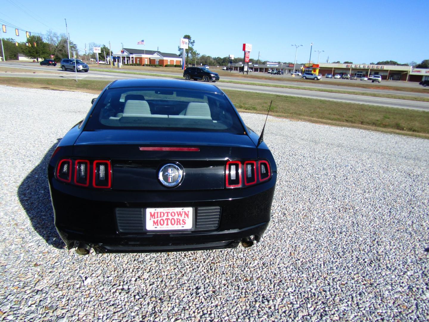 2014 Black Ford Mustang V6 Coupe (1ZVBP8AM2E5) with an 3.7L V6 DOHC 24V engine, Automatic transmission, located at 15016 S Hwy 231, Midland City, AL, 36350, (334) 983-3001, 31.306210, -85.495277 - Photo#5